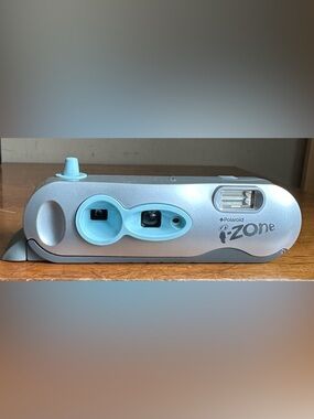 Polaroid i-Zone Instant Camera in Silver and Light Blue Accents